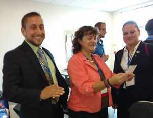 Graciela reading a student veteran's new Personal Branding at the AUTHENTIC Personal Branding for Military Veterans workshop